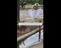 White dress lady dances jumps sidewalk 