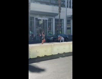 Woman tiktok dance in the middle of the road