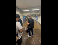 Collab winy - Man carry kid walk barefoot on flood subway