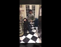 Guy dances humps chair holds beer bottle 