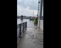 Submitter shows flooded parking lot 