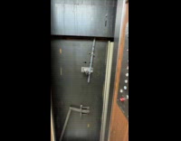 Woman stuck inside elevator