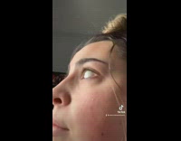 Girl sees tornado out of window of house approaching