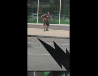 Guy across street lifts shirt up and dances in front of store, harlem shake mannequin head