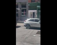 Guy in business professional attire chases guy 