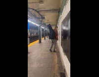 Guy music jam while waiting for subway