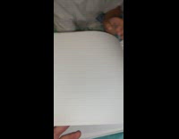 Girl scares brother spider on hand flipping pages