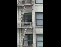 Two women on the building in different window and photoshoot