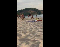 Girl bikini photo shoot kneel beach flash umbrella