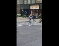 Man dance and shouts in middle of the road at NYC 