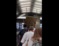 Collab WINY - Man carry lift up table ride escalator