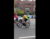 Man using penny farthing on bike tour