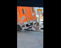 Collab WINY - Trailer truck hits street sign