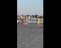 Yellow onesie guy couch keyboard piano beach 