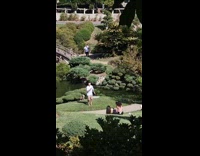 Man flip and dances at Japanese garden