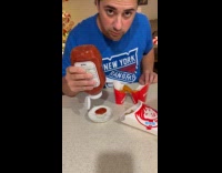 Man uses ring dish as ketchup plate