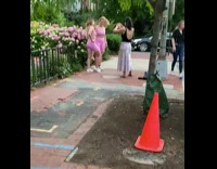 2 women in pink pose together in athletic wear 