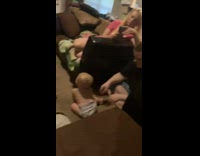 Baby fall on its head on the carpet floor