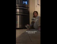 Woman catching mouse luring with peanut butter