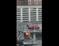Woman in bikini sexy poses beside sports car