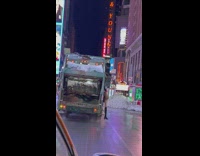 Mannequin leg hangs off garbage truck