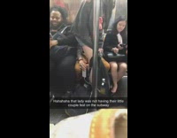 Woman gets annoyed by PDA couple sitting on lap and gets out of seat on subway train