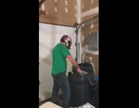 Guy wearing helmet slams bottle against head 