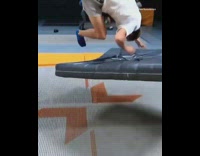 Guy does a triple backflip on indoor trampoline park and lands on his head