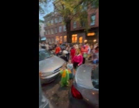 Whole street full of trick or treaters 