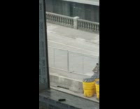 Person rides unicycle on electric scooter cape 