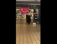 Collab Subway_Creatures - Woman opera singer sings at subway station