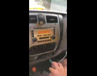 Man holding the hand of taxi driver