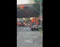 Firefighters try to put fire by tow truck