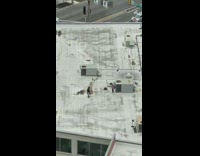 Man photo shoot rooftop black long shirt