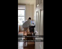 Student with test tubes for lab