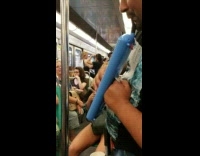 Man plays "Despacito" with a melodica on a bus