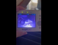 Blanket removed from babys face by invisible force 