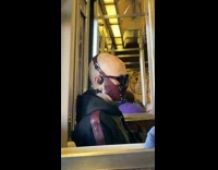 Collab Subway Creatures - Bald Guy on Subway Wears Leather and Metal Mask
