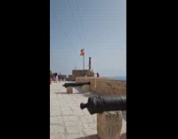 Man shadowbox video shoot top of castle