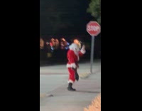 Art the Clown Santa walks on parking part 2