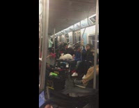 Collab Subway Creatures - giant white rabbit on black table subway