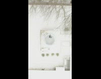 Woman spin skate snow camera fly up 