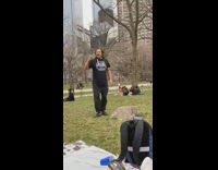 Guy standing on park grass sings pt. 2
