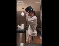 Guy wonders if crockpot is top hat