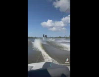 Guy flips on wakeboard then falls in water