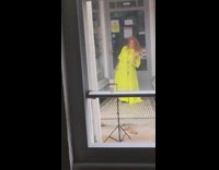Long yellow dress girl building entrance doorway 