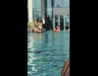 Collab IITW - Black green bikini girl climbs pool ladder 