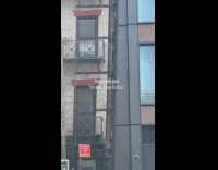 Two buildings tilted and slanted on sides