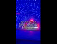 Friends go through light tunnel at drive thru