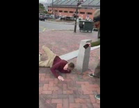 Guy tries to skateboard down railing fail